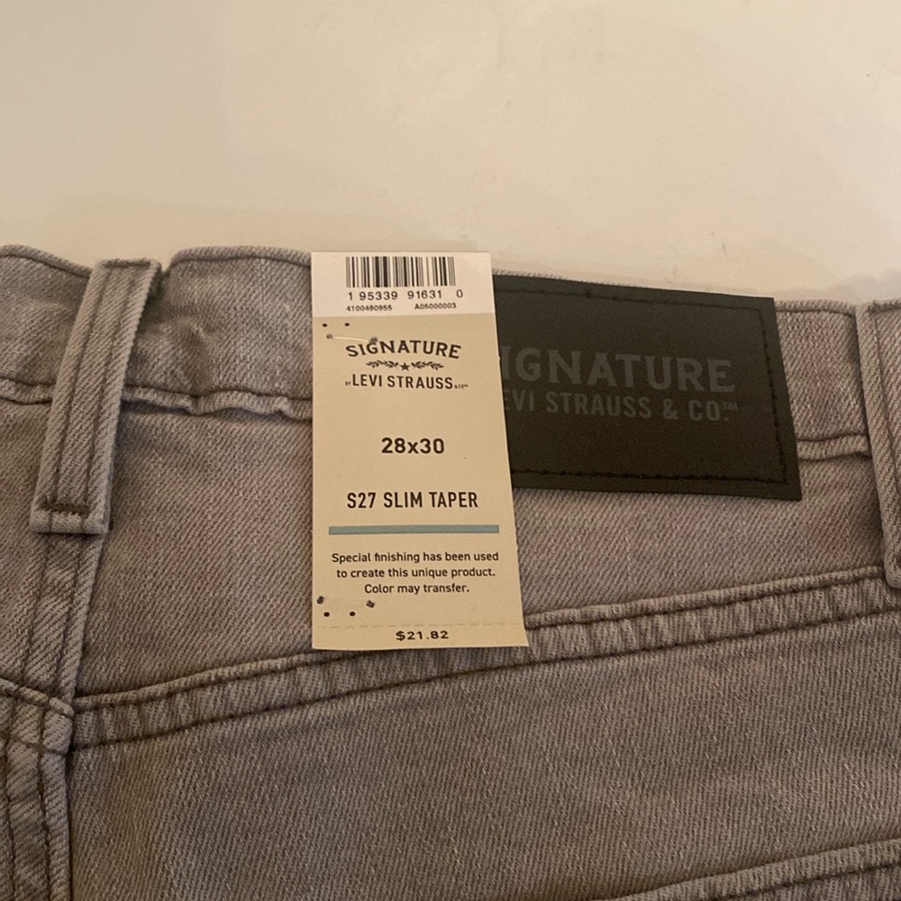 Brand new men’s taper slim fit jeans smoke free home